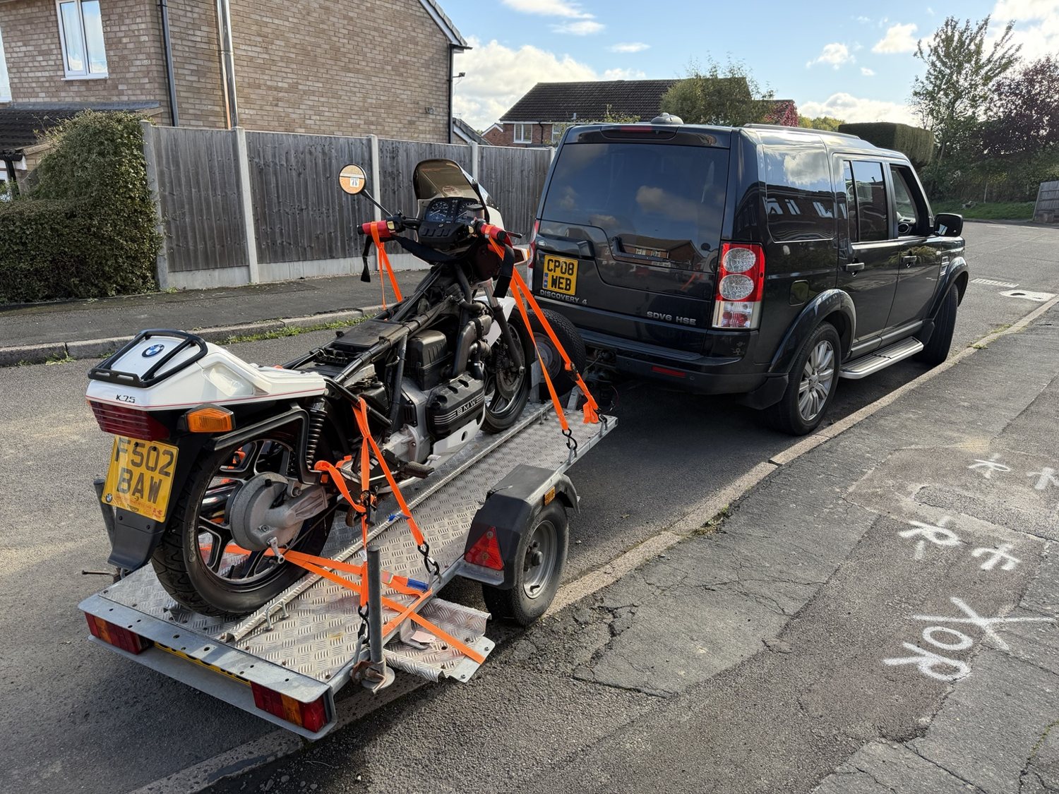 BMW K75C secured on the motorcycle trailer for transport