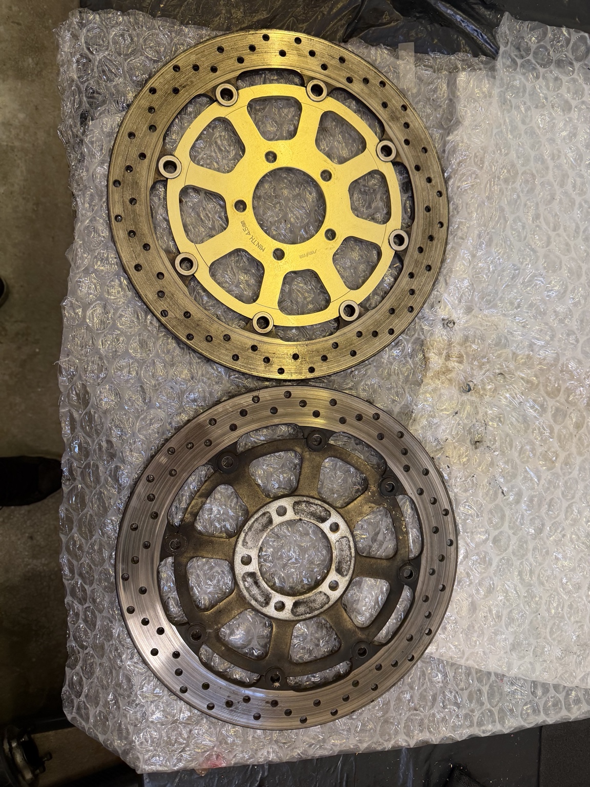 TL1000R brake discs removed during cleaning and inspection