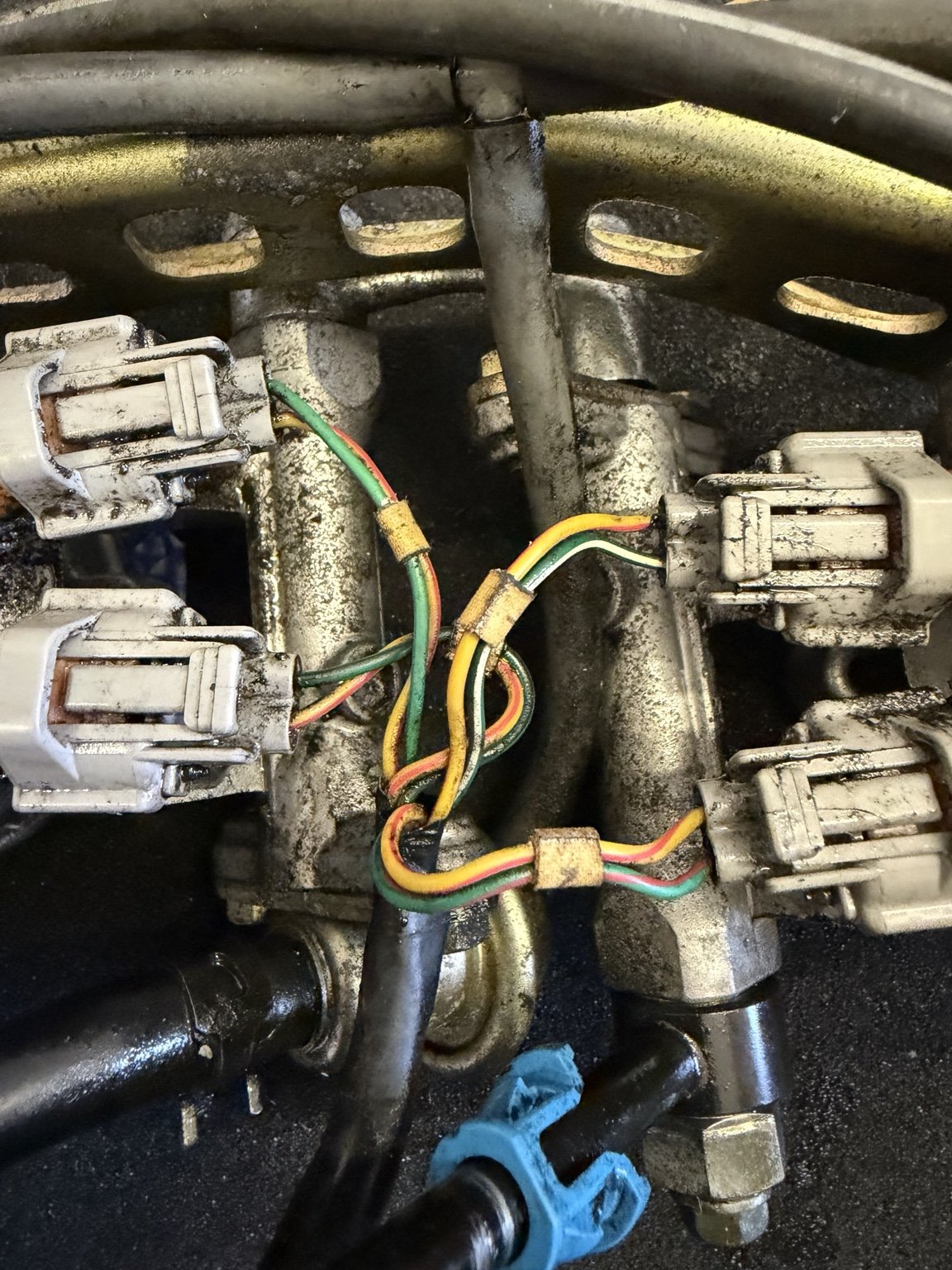Electrical connectors and wiring on removed TL1000R throttle bodies