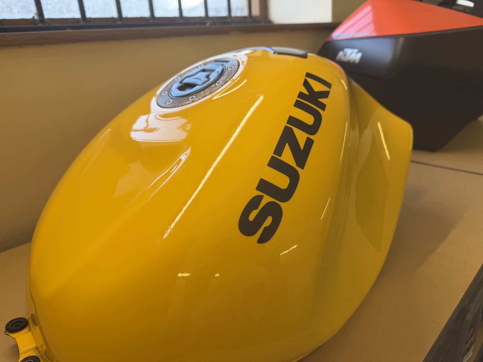 Polished yellow Suzuki TL1000R tank