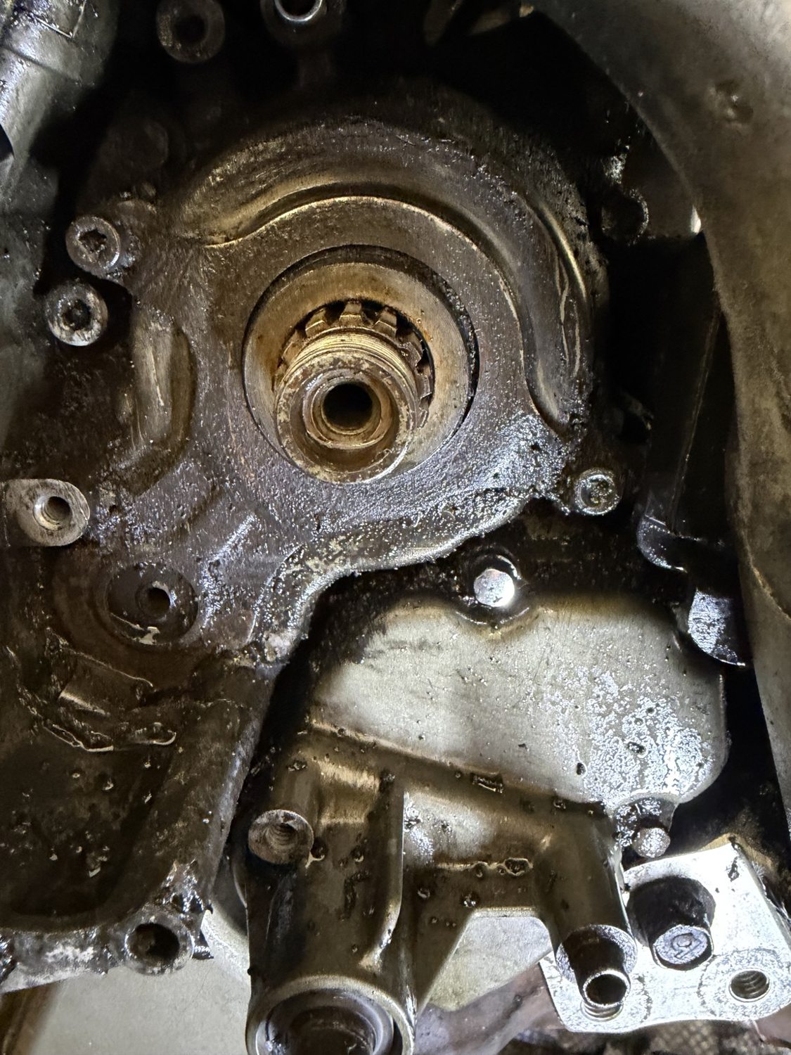 TL1000R front sprocket area after sprocket removal, before detailed cleaning